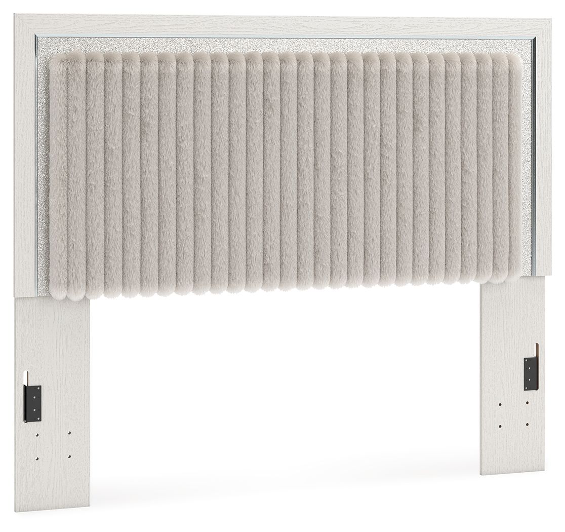 Upholstered panel headboard with tufted vertical stripes and light frame