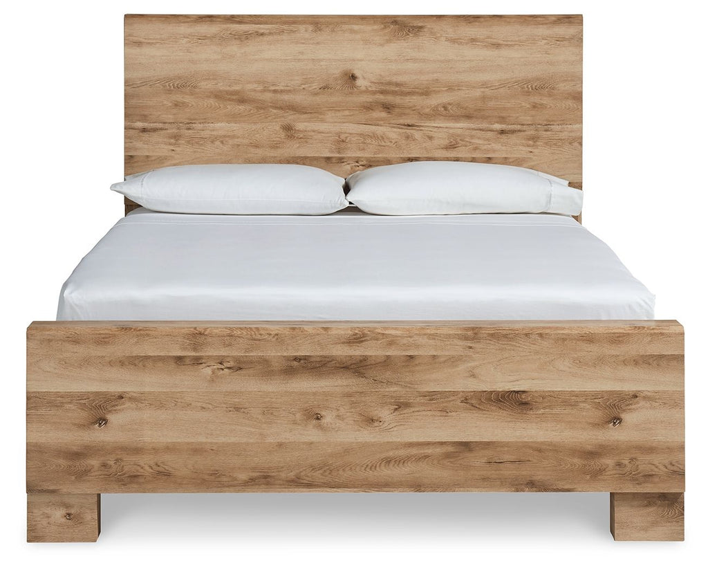 Light beige panel bed with horizontal headboard and white pillows on mattress