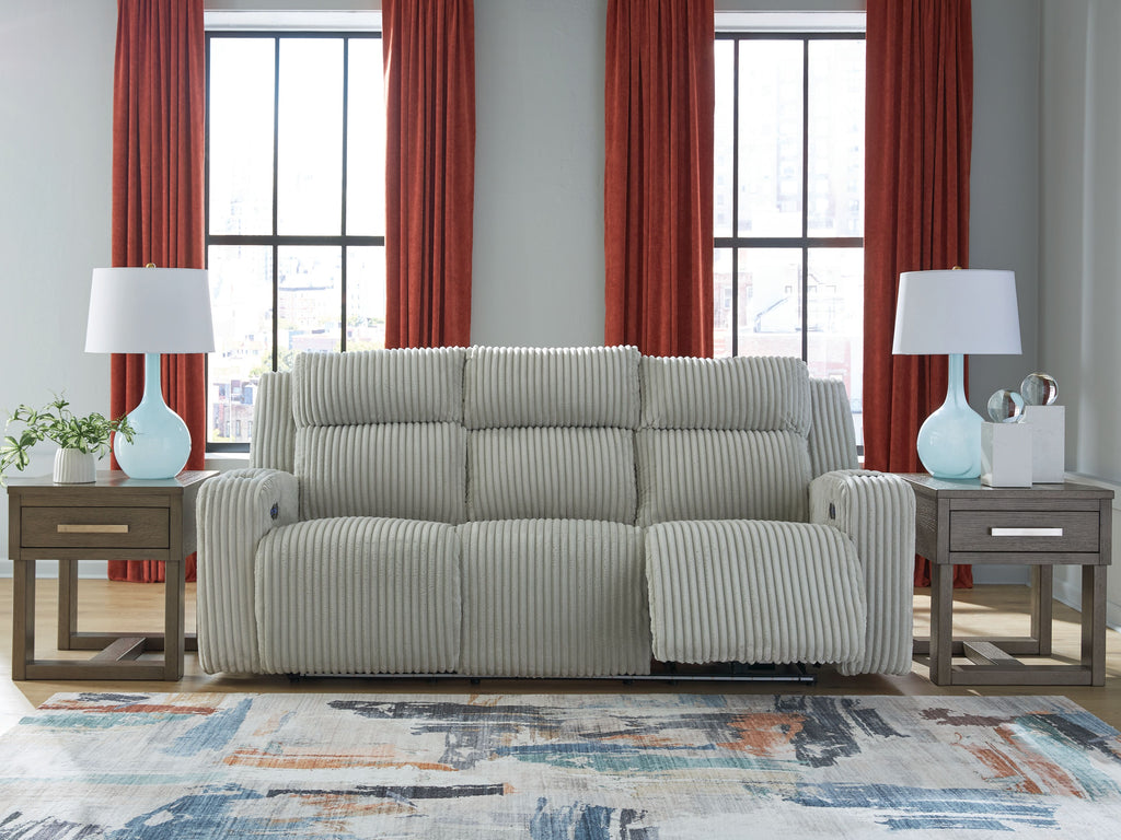 Power reclining sofa with adjustable headrests, light gray ribbed upholstery