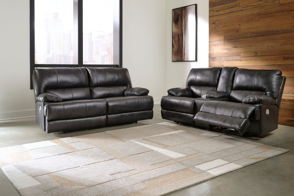 Black leather-look sofa and loveseat with padded arms and tufted back cushions
