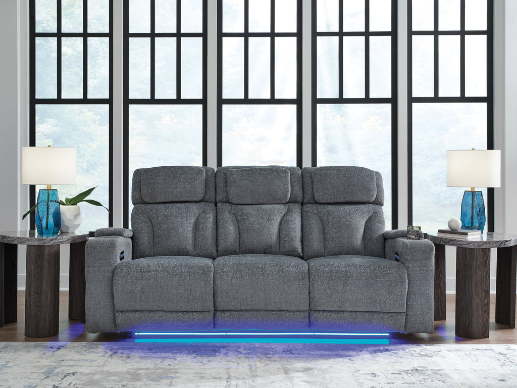Steel gray power reclining sofa with blue light bar under the base