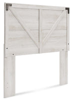 White crossbuck panel headboard with metal corner brackets