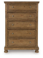 Medium brown wooden five-drawer chest with four drawers and metal knob pulls