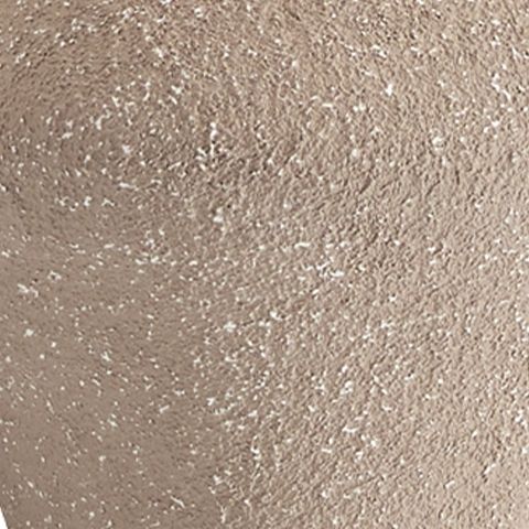 Beige textured metal surface detail with speckled finish