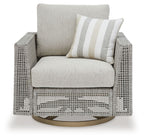 Gray swivel lounge chair with seat cushion and striped lumbar pillow