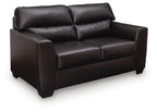 Dark leather-look loveseat with padded arms, tufted back, and two seat cushions