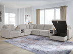 Gray sectional sofa with pull-out storage panels on chaise ends and backrest tilt