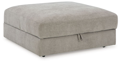 Pebble gray storage ottoman with hinged lid and fabric upholstery
