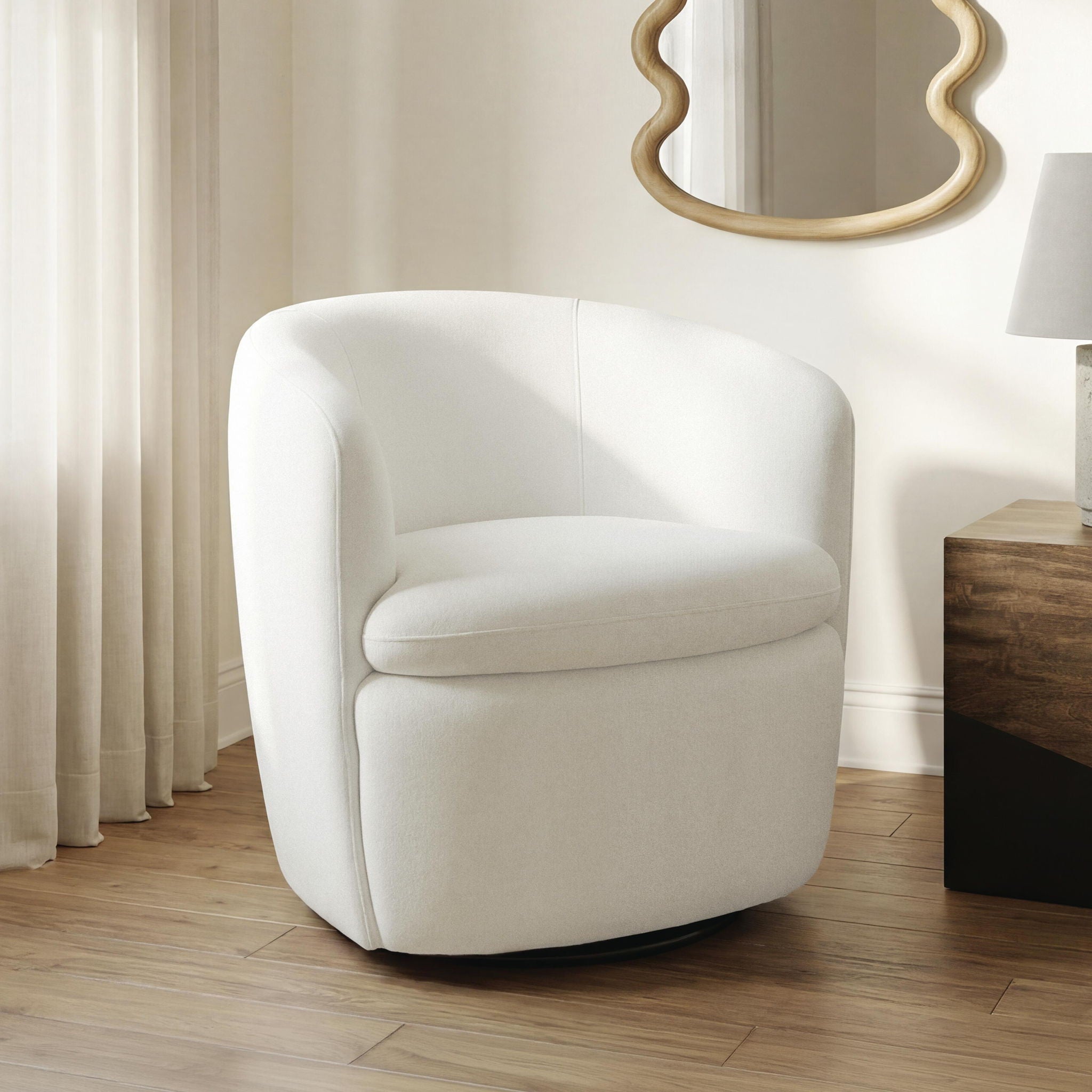 White swivel accent chair with rounded arms and thick padded seat, fabric upholstery.