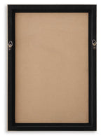 Black framed wall art with blank beige backing