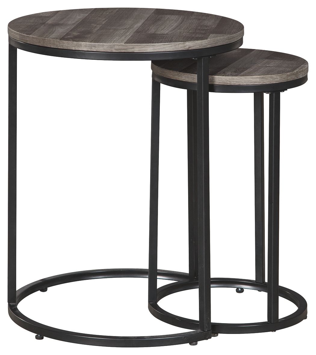 Two round nesting accent tables with gray wood tops and black curved metal bases