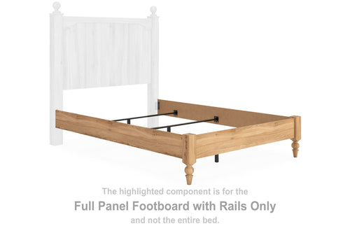 Warm brown wood full panel footboard with rails, bed frame view