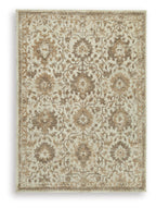 Light brown patterned area rug with ornate medallion motifs and border