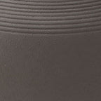 Dalsen vase surface close-up: dark brown stoneware with fine horizontal ribbing.