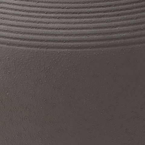Dalsen vase surface close-up: dark brown stoneware with fine horizontal ribbing.