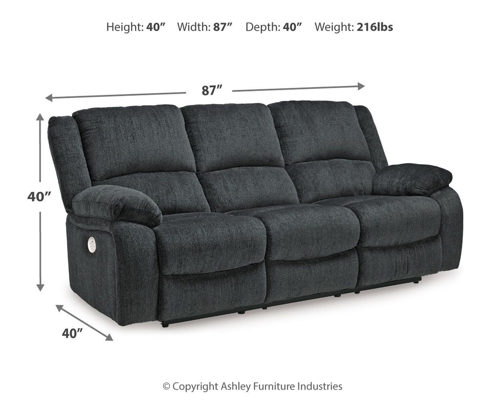 Draycoll reclining sofa in slate with tufted back, padded chaise seat, and rounded track arms