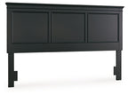 Black panel headboard with three inset rectangular panels and flat top rail