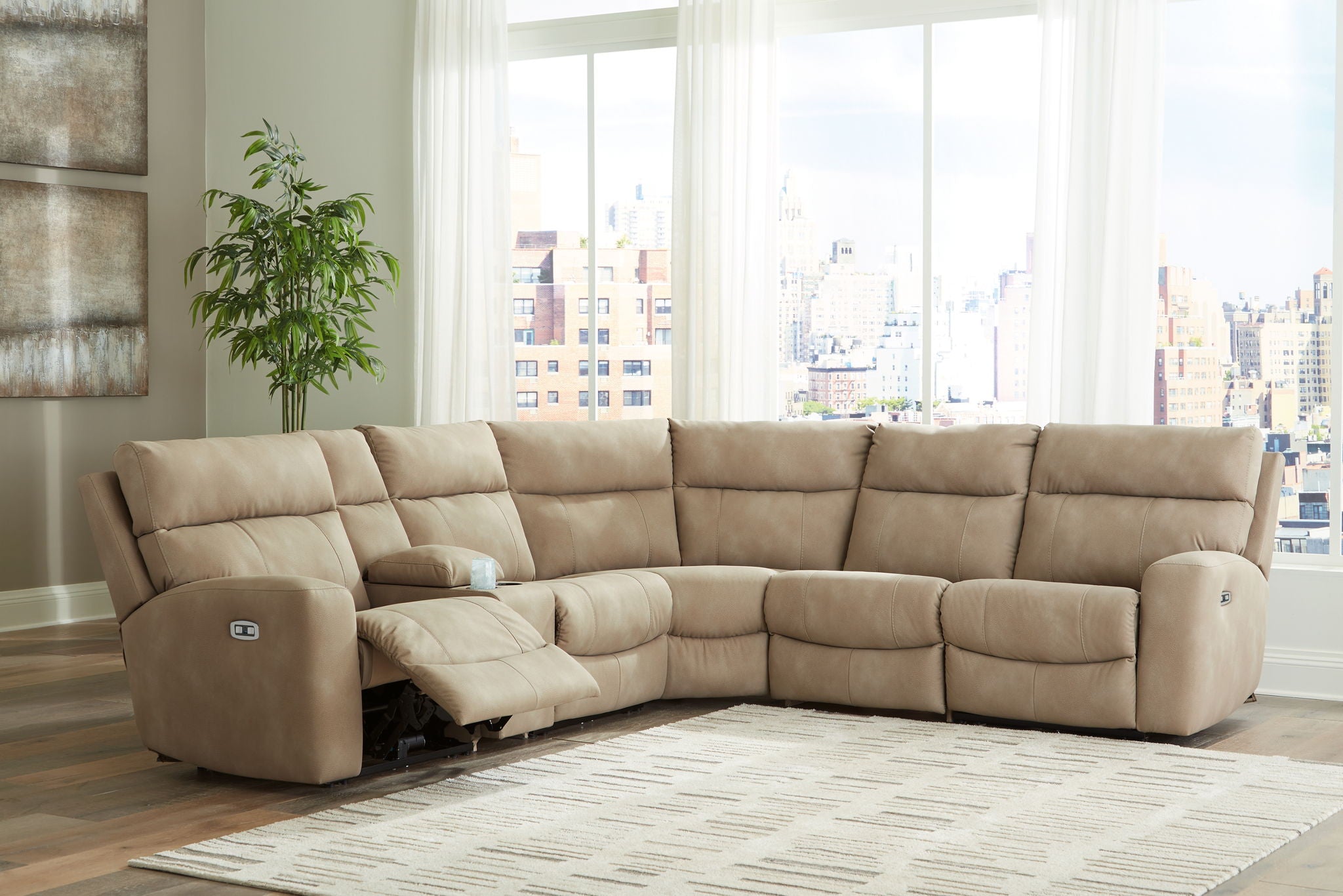 Beige power reclining sectional set with padded arms and power recline seats