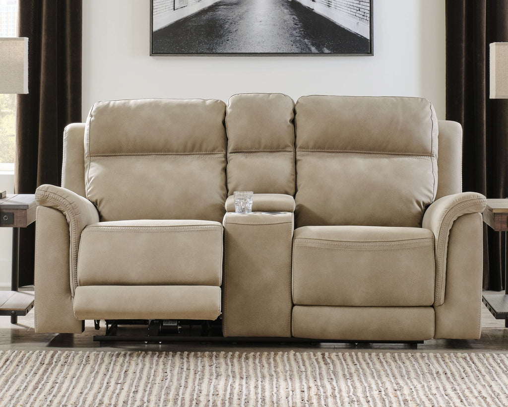 Beige reclining power loveseat with center console and plush cushioned arms