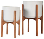 Set of 2 white planters with brown wooden legs and square bases