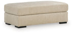 Lofwood Ottoman in textured beige fabric with rounded corners and black feet