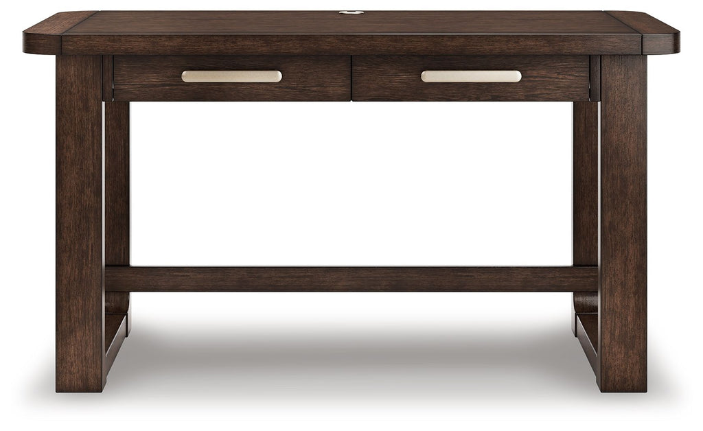 Dark brown home office desk with two center drawers and open lower shelf, front