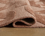 Perrenton rug corner close-up, short textured pile with visible underside