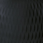 Etney vase close-up, dark gray embossed wave texture across ceramic surface