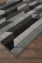 Dark gray and light gray geometric area rug with stripe and zigzag block pattern