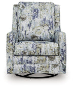 Swivel glider accent chair with patterned seat and back cushions in blue-green speckles