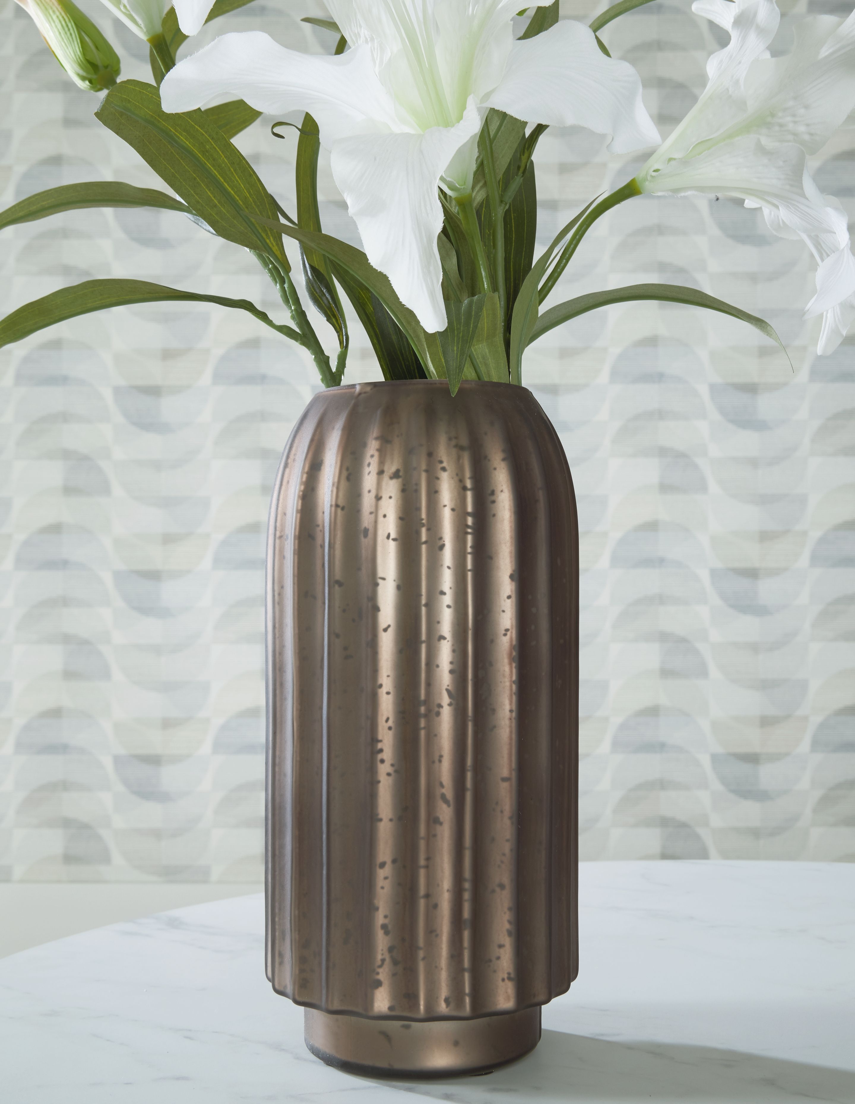 Tall metallic vase with vertical ribbed texture, dark brown finish