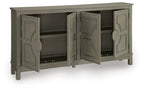 Warm gray accent cabinet with two center doors open, showing interior shelves