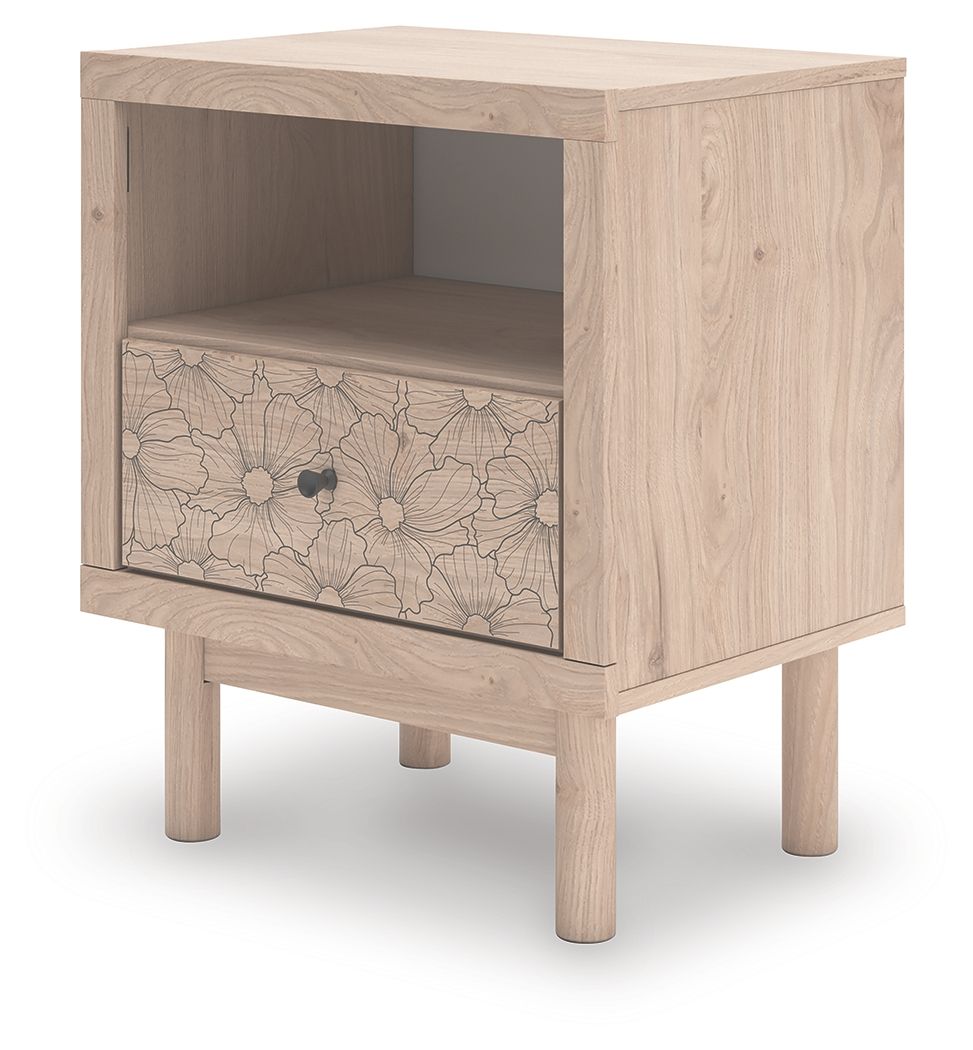Tan wood one-drawer night stand with open shelf and floral drawer front, side angle