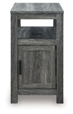 Chair side end table with open shelf and one-door cabinet, dark gray wood grain, black pull.