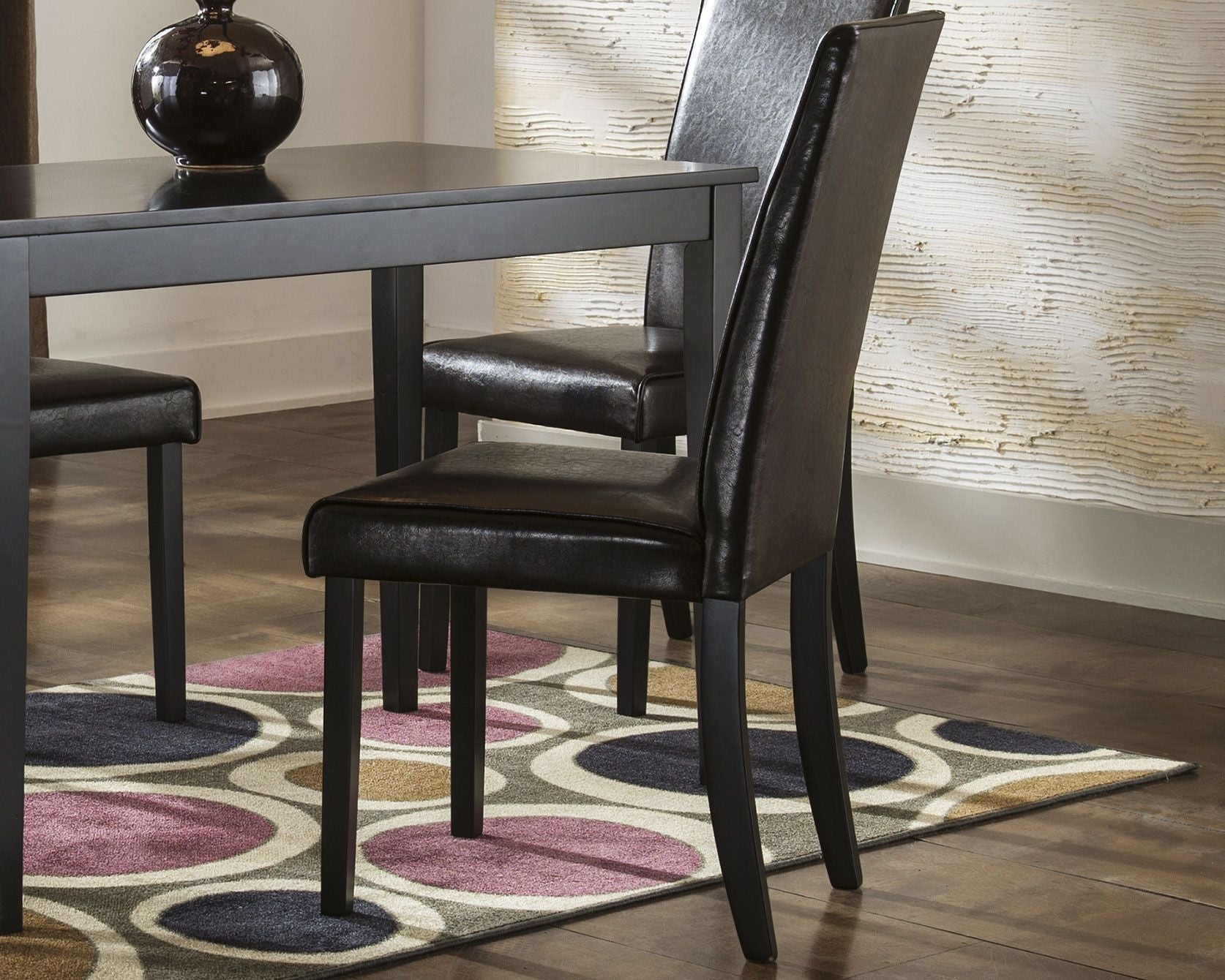 Dining side chair in dark brown upholstery with padded seat and straight legs