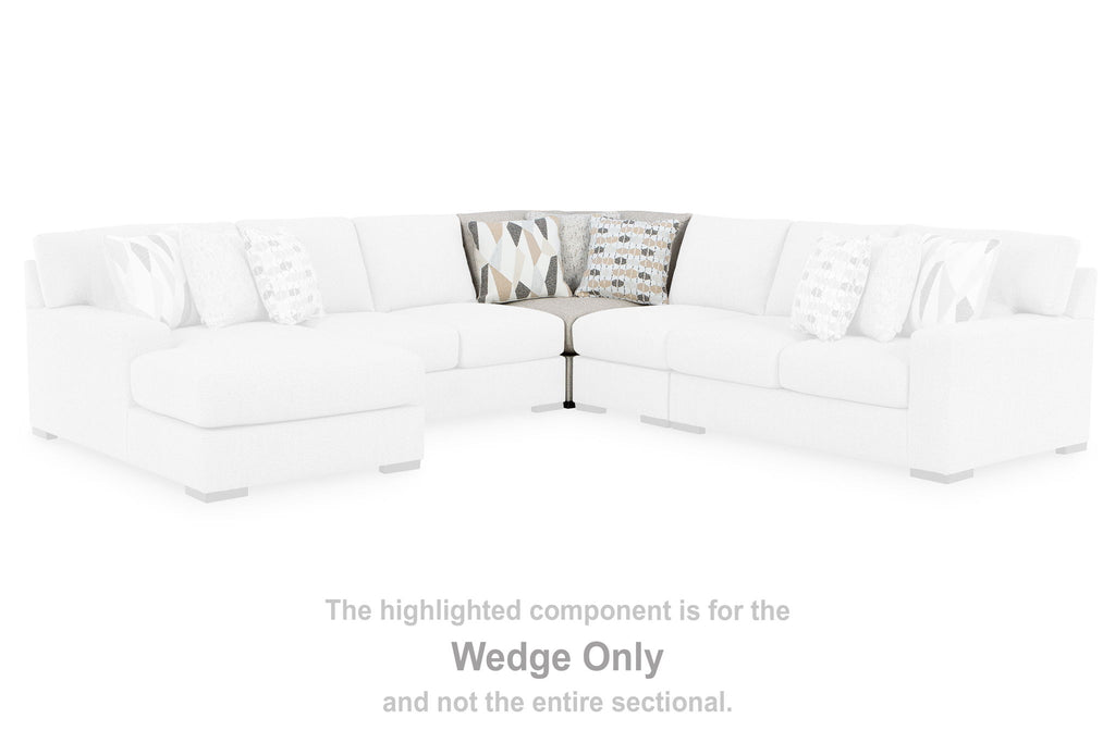 Sectional wedge only with light upholstery, corner shape, and multiple seat cushions