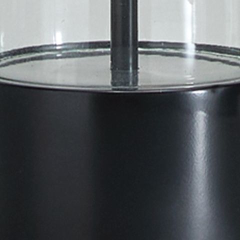 Black metal lamp base with central stem detail and glossy finish
