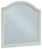 Youth bedroom mirror with arched top and antique white wood frame