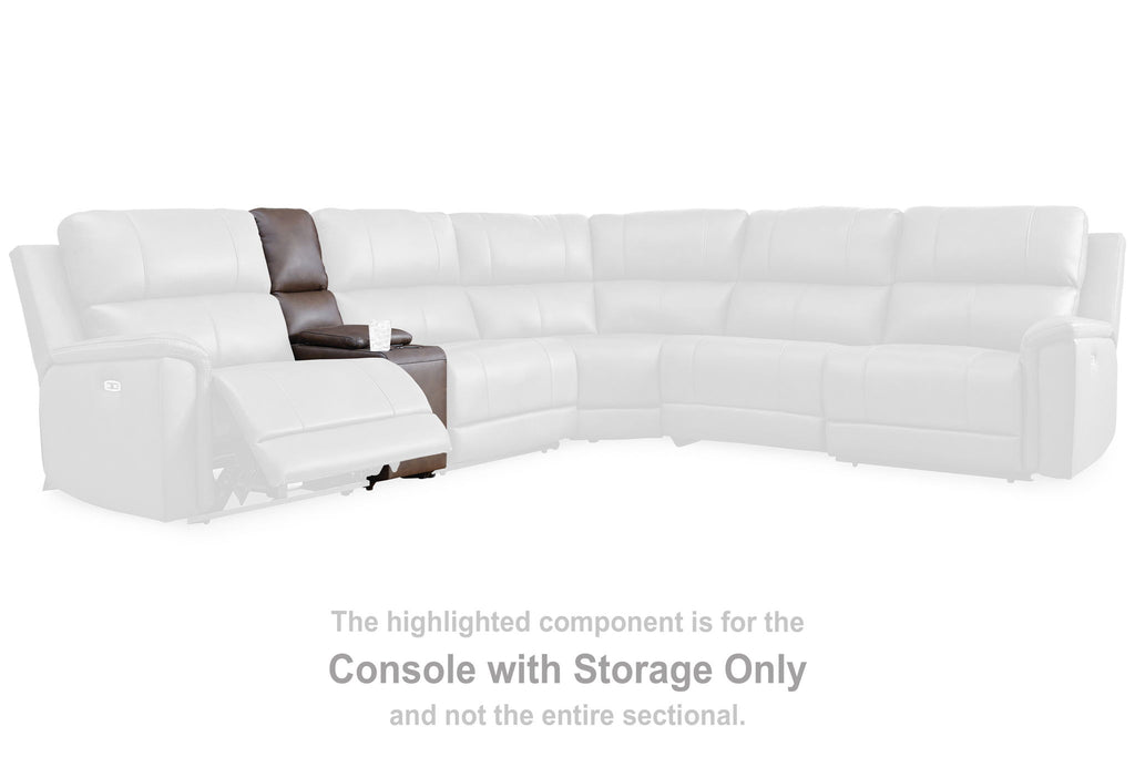 Console with storage component on a white sectional sofa, shown in one corner