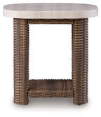 Brown woven end table with round tabletop and open lower shelf