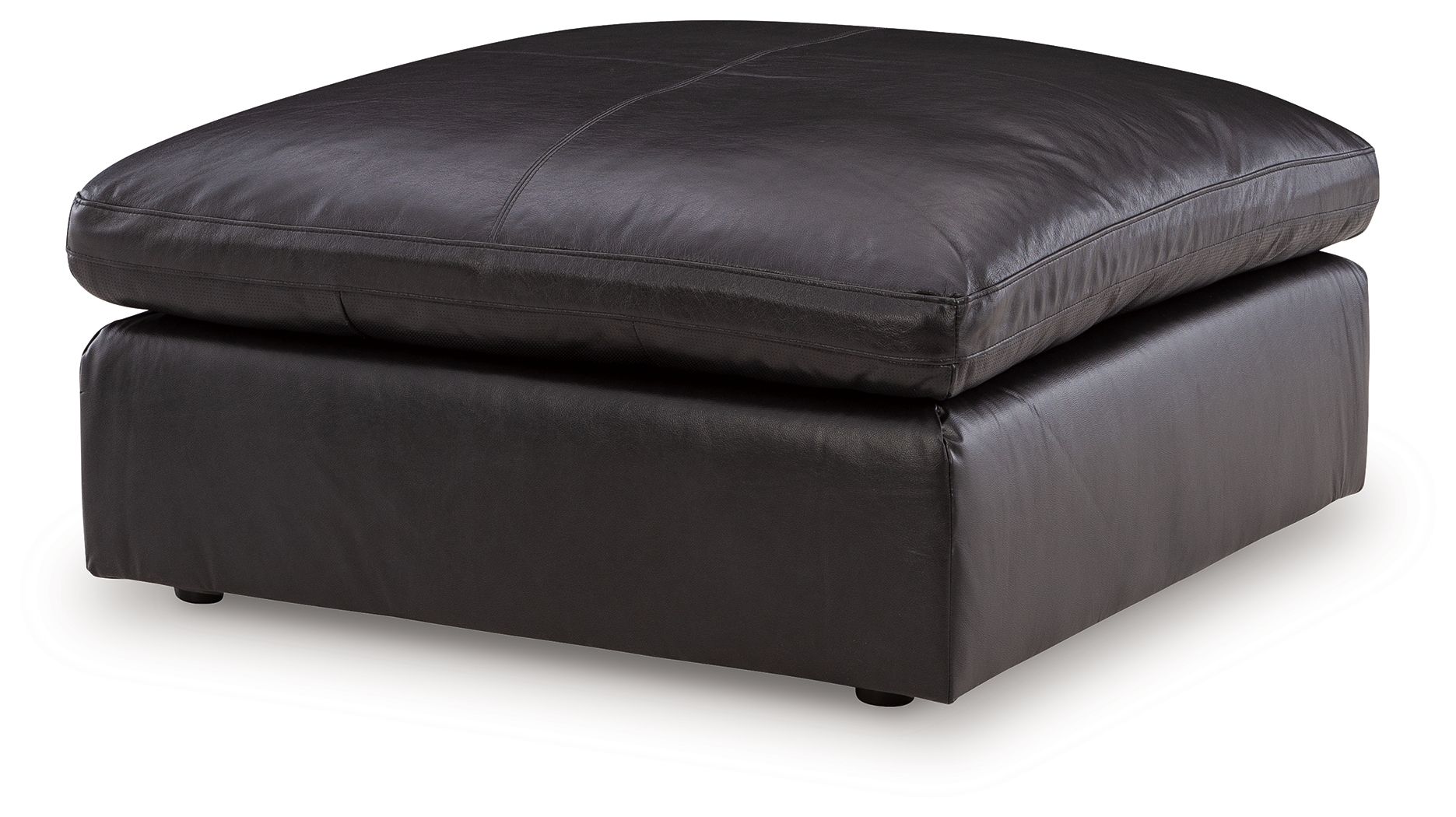 Black oversized accent ottoman with rounded top, smooth upholstery, and short legs