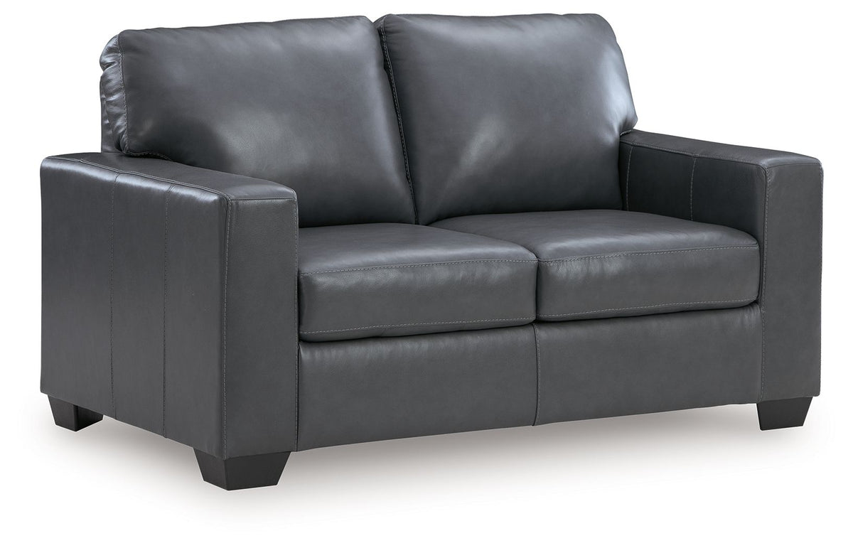 Gray loveseat sofa with two back cushions, padded arms, and dark tapered feet