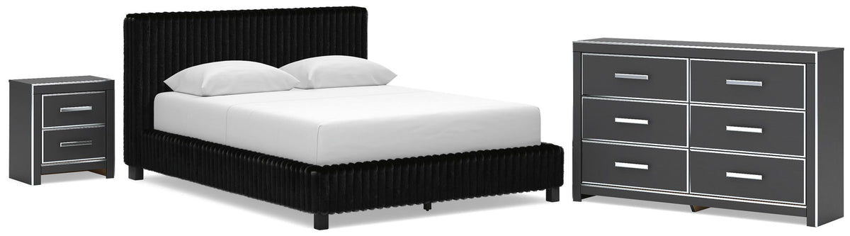 Black upholstered bed frame with matching nightstand and dresser with mirror