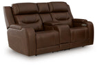 Power reclining loveseat with audio seating, dark-brown upholstery, reclined seat with arms