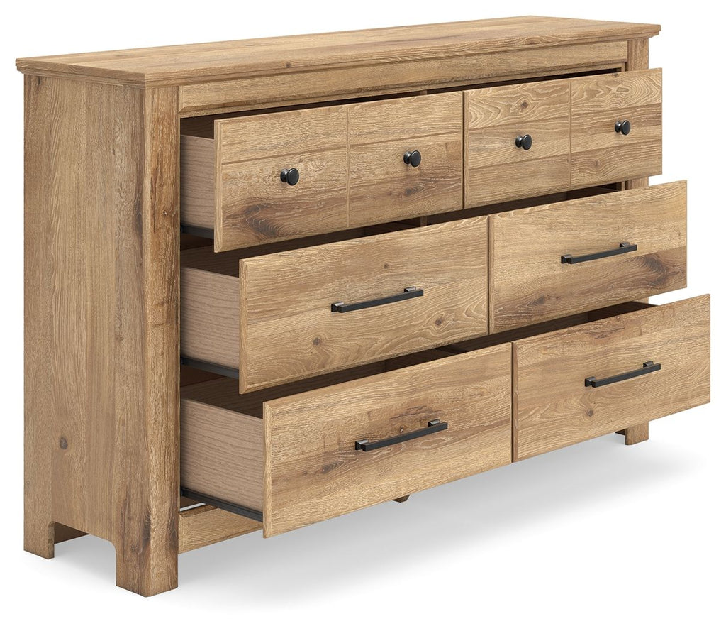 Light brown dresser with six drawers and black bar pulls, angled side view