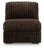 Chocolate-brown armless chair with channel-tufted cord upholstery and padded seat/back.