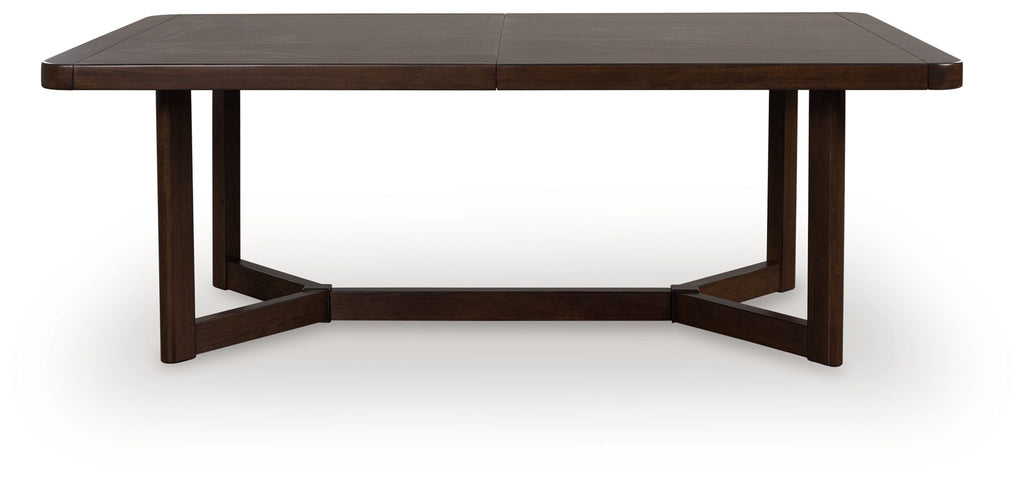 Dark brown rectangular extension dining table with open base and apron.