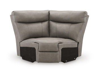 Wedge armchair with padded arms and dark side accents, gray upholstery.
