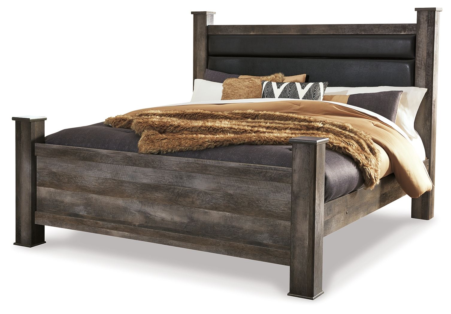 Gray upholstered poster bed with tall headboard, solid footboard, and pillows