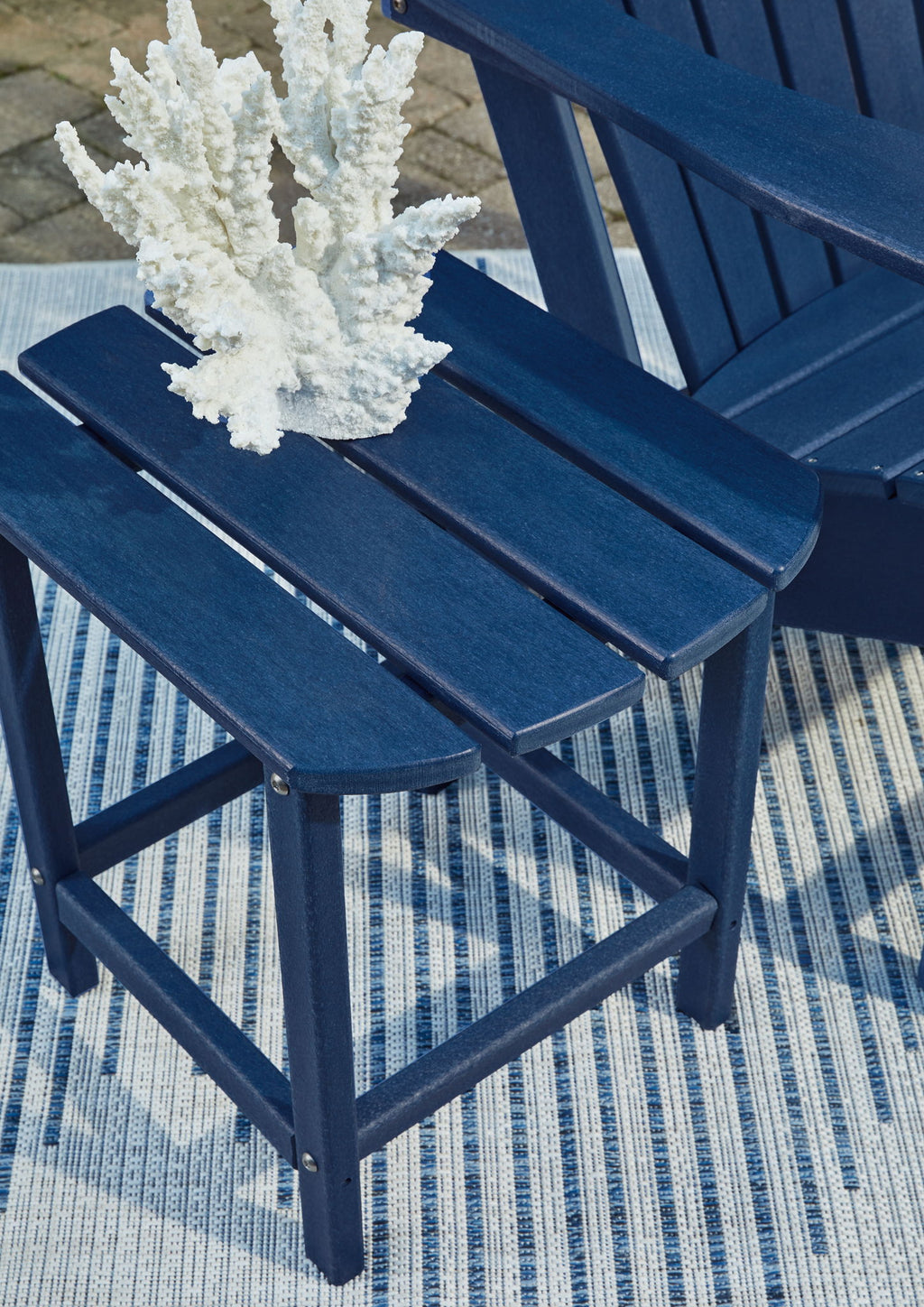 Blue slatted outdoor side table with angled legs